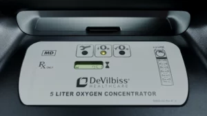 Display des Compact 525KS während der Warmlaufphase mit Sanduhr-Symbol